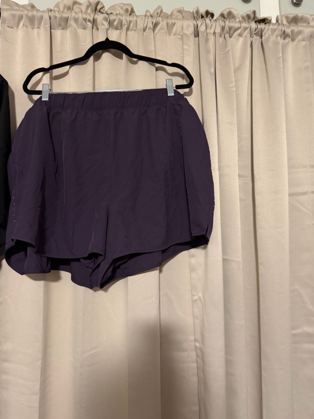 Two pairs of Old Navy Women's Athletic Shorts- one black pair one dark purple